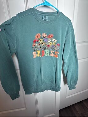 Comfort Colors teal crewneck with multicolor floral BADASS graphic